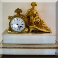 D01. Antique French mantel clock with a marble base. 